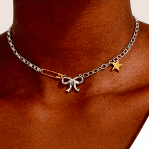 “Two-tone bow and star charm necklace”