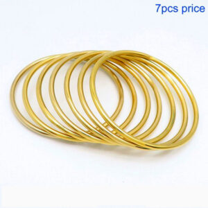 Stainless Steel Minimalist Bangle Set (7 Pieces) – 60mm B077